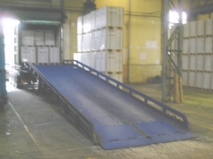Container with ramp